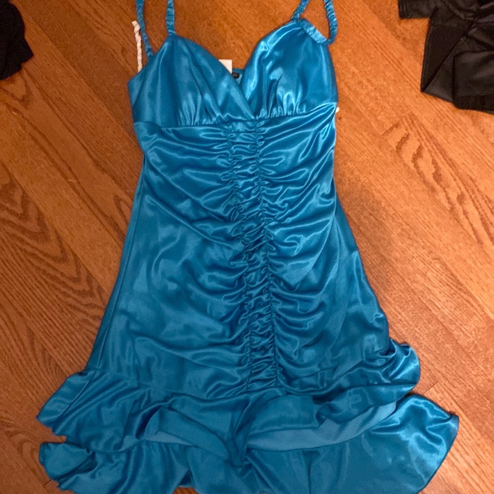 gorgeous teal dress made by city triangles